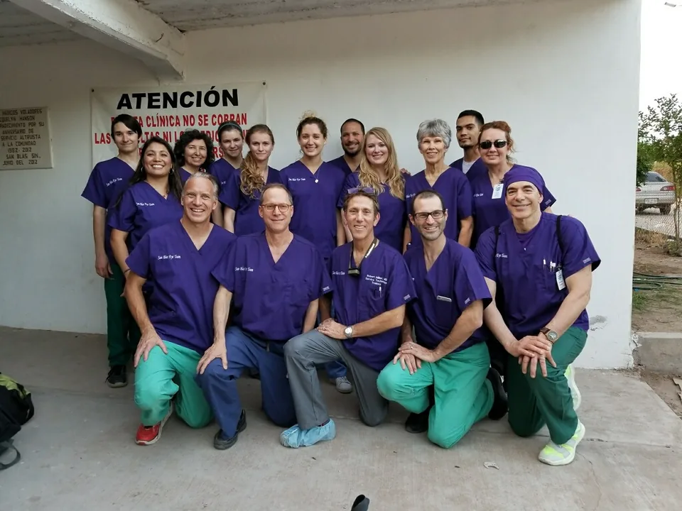 Dr. Perlman with a volunteer medical mission team in scrubs